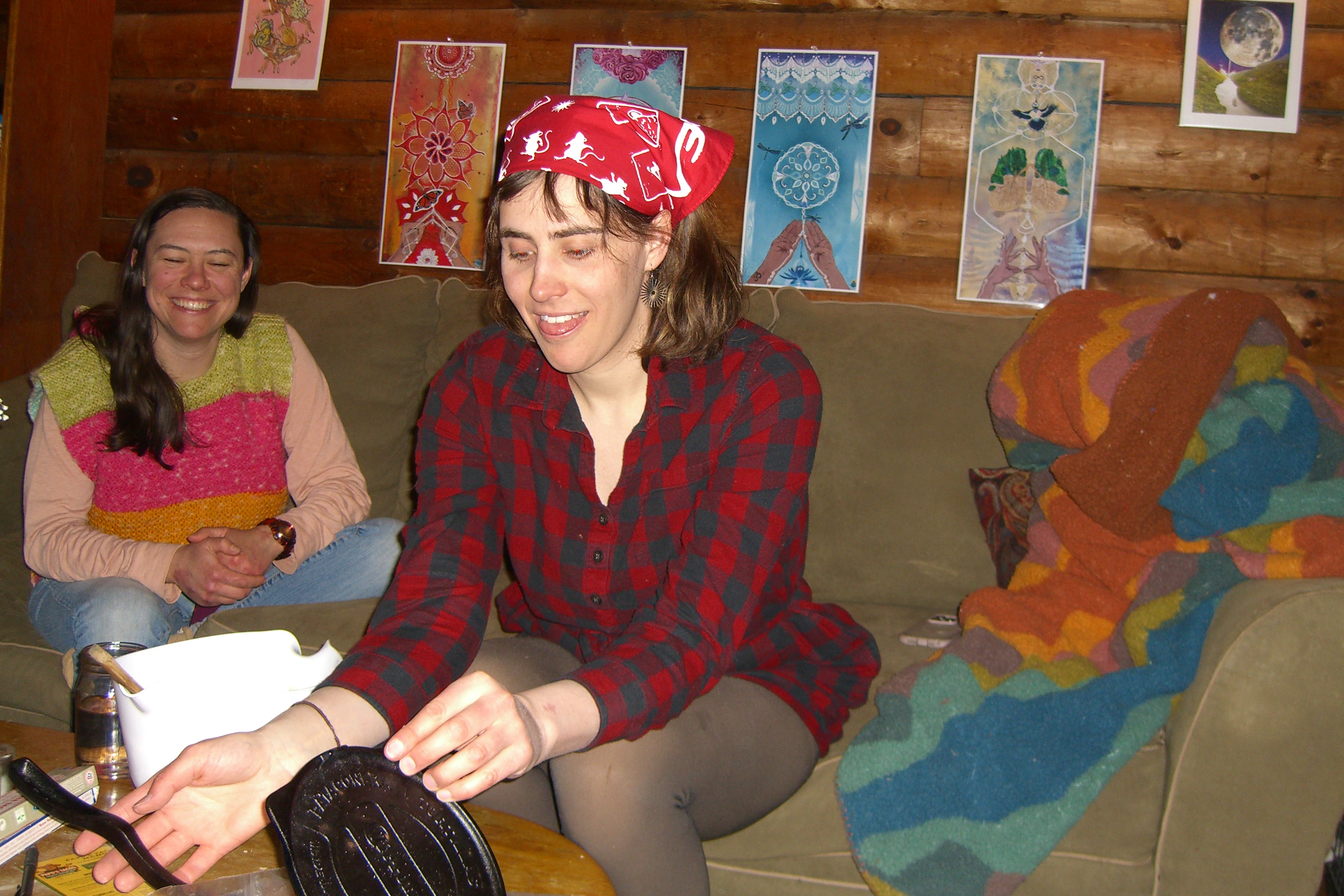 Two friends hanging out at a cabin